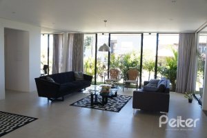 Casa em Condomínio à venda com 288m², 3 dormitórios, 3 suítes, 4 vagas, no bairro Terra Ville em PORTO ALEGRE
