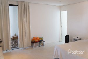 Casa em Condomínio à venda com 288m², 3 dormitórios, 3 suítes, 4 vagas, no bairro Terra Ville em PORTO ALEGRE