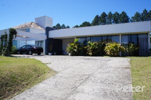 Casa em Condomínio à venda com 288m², 3 dormitórios, 3 suítes, 4 vagas, no bairro Terra Ville em PORTO ALEGRE
