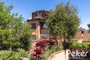 Casa em Condomínio à venda com 292m², 4 dormitórios, 2 suítes, 3 vagas, no bairro Vila Assunção em Porto Alegre