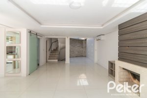 Casa em Condomínio à venda com 292m², 4 dormitórios, 2 suítes, 3 vagas, no bairro Vila Assunção em Porto Alegre