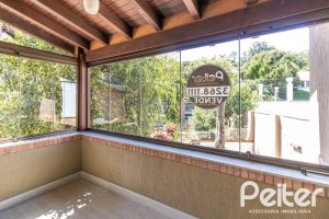 Casa em Condomínio à venda com 292m², 4 dormitórios, 2 suítes, 3 vagas, no bairro Vila Assunção em Porto Alegre