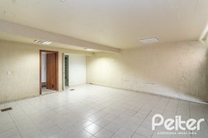 Casa em Condomínio à venda com 292m², 4 dormitórios, 2 suítes, 3 vagas, no bairro Vila Assunção em Porto Alegre