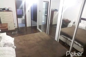 Casa à venda com 156m², 3 dormitórios, 1 suíte, 3 vagas, no bairro Vila Nova em Porto Alegre