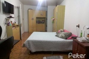 Casa à venda com 156m², 3 dormitórios, 1 suíte, 3 vagas, no bairro Vila Nova em Porto Alegre