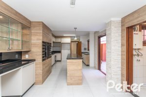 Casa em Condomínio à venda com 286m², 3 dormitórios, 1 suíte, 2 vagas, no bairro Cristal em PORTO ALEGRE