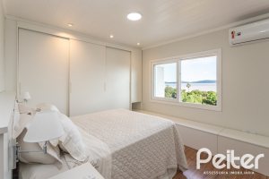 Casa em Condomínio à venda com 196m², 3 dormitórios, 1 suíte, 2 vagas, no bairro Sétimo Céu em PORTO ALEGRE