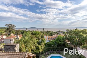 Casa em Condomínio à venda com 196m², 3 dormitórios, 1 suíte, 2 vagas, no bairro Sétimo Céu em PORTO ALEGRE