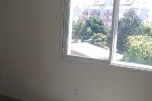 Apartamento à venda com 66m², 2 dormitórios, 1 suíte, 2 vagas, no bairro Cavalhada em Porto Alegre