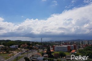 Apartamento à venda com 66m², 2 dormitórios, 1 suíte, 2 vagas, no bairro Cavalhada em Porto Alegre