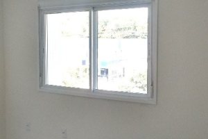 Apartamento à venda com 66m², 2 dormitórios, 1 suíte, 2 vagas, no bairro Cavalhada em Porto Alegre