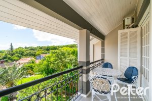 Casa à venda com 320m², 4 dormitórios, 2 suítes, 3 vagas, no bairro Jardim Isabel em Porto Alegre