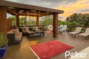 Casa à venda com 450m², 4 dormitórios, 2 suítes, 3 vagas, no bairro Vila Assunção em Porto Alegre