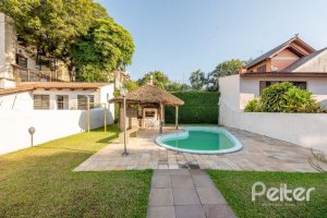 Casa à venda com 268m², 3 dormitórios, 1 suíte, 3 vagas, no bairro Jardim Isabel em Porto Alegre