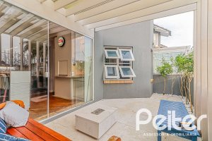 Casa em Condomínio à venda com 286m², 3 dormitórios, 1 suíte, 3 vagas, no bairro Jardim Isabel em Porto Alegre