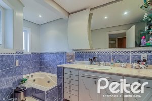 Casa em Condomínio à venda com 286m², 3 dormitórios, 1 suíte, 3 vagas, no bairro Jardim Isabel em Porto Alegre