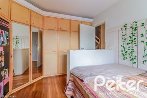 Casa em Condomínio à venda com 286m², 3 dormitórios, 1 suíte, 3 vagas, no bairro Jardim Isabel em Porto Alegre