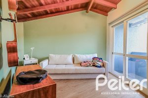 Casa em Condomínio à venda com 286m², 3 dormitórios, 1 suíte, 3 vagas, no bairro Jardim Isabel em Porto Alegre