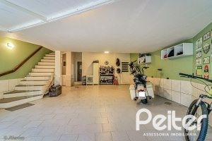 Casa em Condomínio à venda com 286m², 3 dormitórios, 1 suíte, 3 vagas, no bairro Jardim Isabel em Porto Alegre