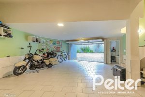 Casa em Condomínio à venda com 286m², 3 dormitórios, 1 suíte, 3 vagas, no bairro Jardim Isabel em Porto Alegre