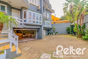 Casa em Condomínio à venda com 286m², 3 dormitórios, 1 suíte, 3 vagas, no bairro Jardim Isabel em Porto Alegre