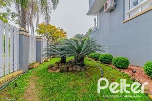 Casa em Condomínio à venda com 286m², 3 dormitórios, 1 suíte, 3 vagas, no bairro Jardim Isabel em Porto Alegre