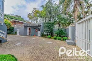 Casa em Condomínio à venda com 286m², 3 dormitórios, 1 suíte, 3 vagas, no bairro Jardim Isabel em Porto Alegre