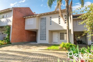 Casa em Condomínio à venda com 221m², 4 dormitórios, 1 suíte, 2 vagas, no bairro Jardim Isabel em Porto Alegre