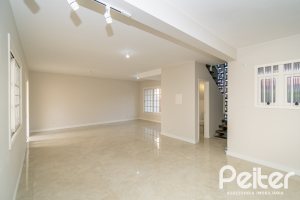 Casa em Condomínio à venda com 221m², 4 dormitórios, 1 suíte, 2 vagas, no bairro Jardim Isabel em Porto Alegre