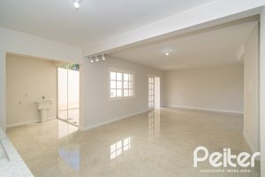 Casa em Condomínio à venda com 221m², 4 dormitórios, 1 suíte, 2 vagas, no bairro Jardim Isabel em Porto Alegre