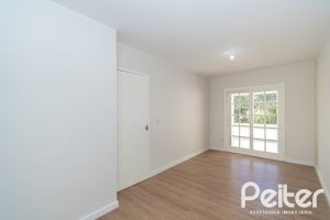 Casa em Condomínio à venda com 221m², 4 dormitórios, 1 suíte, 2 vagas, no bairro Jardim Isabel em Porto Alegre