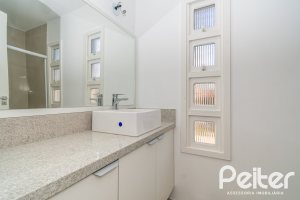 Casa em Condomínio à venda com 221m², 4 dormitórios, 1 suíte, 2 vagas, no bairro Jardim Isabel em Porto Alegre