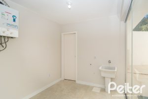 Casa em Condomínio à venda com 221m², 4 dormitórios, 1 suíte, 2 vagas, no bairro Jardim Isabel em Porto Alegre