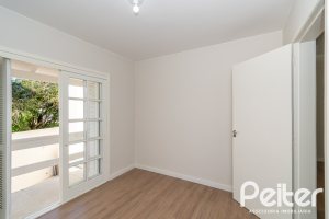 Casa em Condomínio à venda com 221m², 4 dormitórios, 1 suíte, 2 vagas, no bairro Jardim Isabel em Porto Alegre