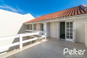 Casa em Condomínio à venda com 221m², 4 dormitórios, 1 suíte, 2 vagas, no bairro Jardim Isabel em Porto Alegre