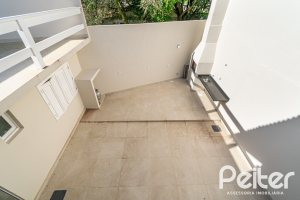 Casa em Condomínio à venda com 221m², 4 dormitórios, 1 suíte, 2 vagas, no bairro Jardim Isabel em Porto Alegre