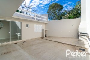 Casa em Condomínio à venda com 221m², 4 dormitórios, 1 suíte, 2 vagas, no bairro Jardim Isabel em Porto Alegre