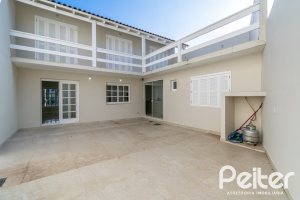 Casa em Condomínio à venda com 221m², 4 dormitórios, 1 suíte, 2 vagas, no bairro Jardim Isabel em Porto Alegre