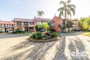 Casa em Condomínio à venda com 221m², 4 dormitórios, 1 suíte, 2 vagas, no bairro Jardim Isabel em Porto Alegre