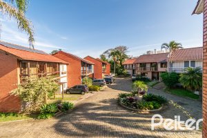 Casa em Condomínio à venda com 221m², 4 dormitórios, 1 suíte, 2 vagas, no bairro Jardim Isabel em Porto Alegre