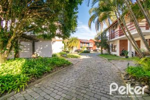 Casa em Condomínio à venda com 221m², 4 dormitórios, 1 suíte, 2 vagas, no bairro Jardim Isabel em Porto Alegre