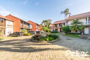 Casa em Condomínio à venda com 221m², 4 dormitórios, 1 suíte, 2 vagas, no bairro Jardim Isabel em Porto Alegre