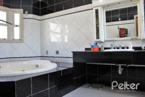 Casa à venda com 352m², 4 dormitórios, 2 suítes, 3 vagas, no bairro Jardim Isabel em Porto Alegre