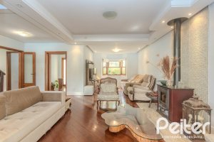 Casa à venda com 352m², 4 dormitórios, 2 suítes, 3 vagas, no bairro Jardim Isabel em Porto Alegre
