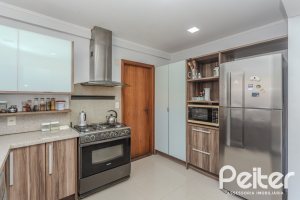Casa à venda com 352m², 4 dormitórios, 2 suítes, 3 vagas, no bairro Jardim Isabel em Porto Alegre