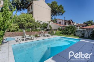 Casa à venda com 352m², 4 dormitórios, 2 suítes, 3 vagas, no bairro Jardim Isabel em Porto Alegre