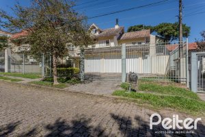 Casa à venda com 352m², 4 dormitórios, 2 suítes, 3 vagas, no bairro Jardim Isabel em Porto Alegre
