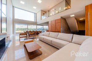 Casa em Condomínio à venda com 289m², 4 dormitórios, 4 suítes, 2 vagas, no bairro Alphaville em PORTO ALEGRE