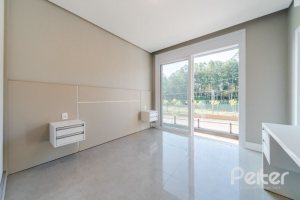 Casa em Condomínio à venda com 289m², 4 dormitórios, 4 suítes, 2 vagas, no bairro Alphaville em PORTO ALEGRE