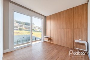 Casa em Condomínio à venda com 289m², 4 dormitórios, 4 suítes, 2 vagas, no bairro Alphaville em PORTO ALEGRE